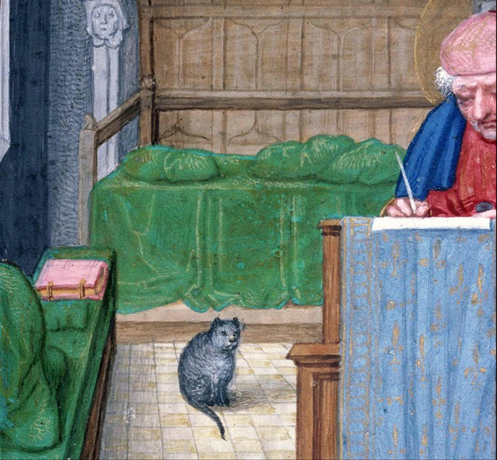 Illuminated manuscript showing St. Matthew with a cat, indicating the presence of cats even in religious contexts.