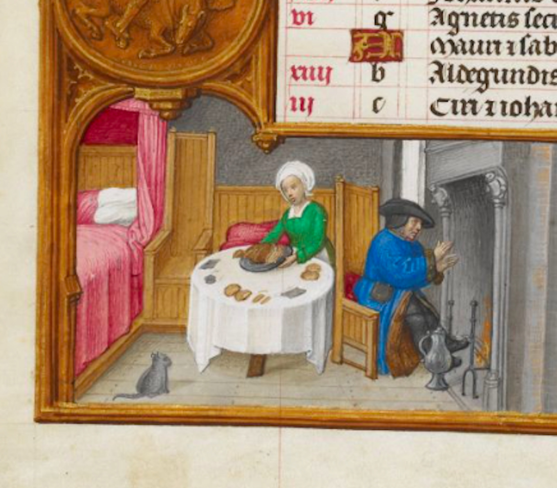 An illustration from a Book of Hours circa 1500, showing a domestic scene with a cat observing a man and woman in a household setting.