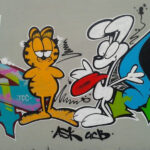 Garfield, the iconic animated orange tabby cat known for his love of lasagna, as seen in various cartoon adaptations.