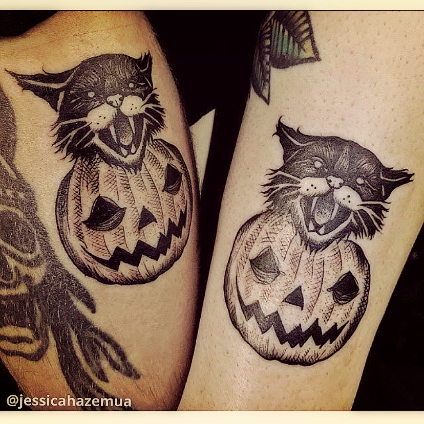 Cute Halloween themed black cat tattoo with pumpkin