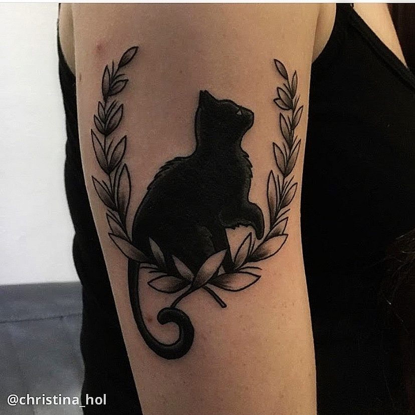 Simple black cat silhouette tattoo