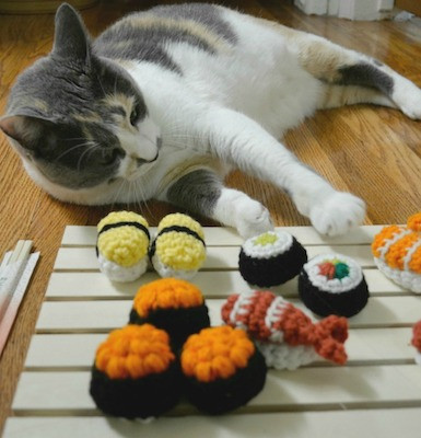 Close up of crochet sushi cat toys showing detail and texture, perfect for catnip filling