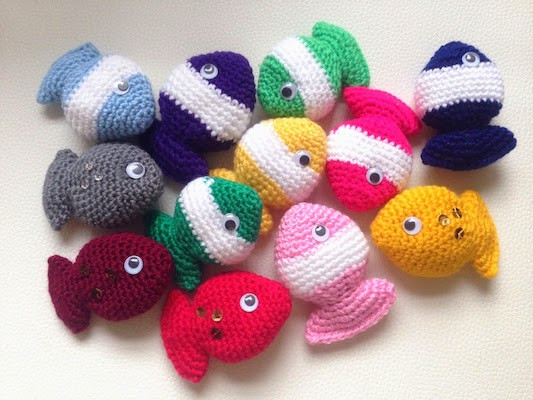 Small, colorful crochet fish candy cat toy in bright colors, great for stash busting