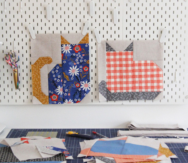 Close-up of fabrics used in the Kitty Cats Quilt, featuring Birdsong by Gingiber and Essex Linen in Flax, ideal for a cute cat quilt project.