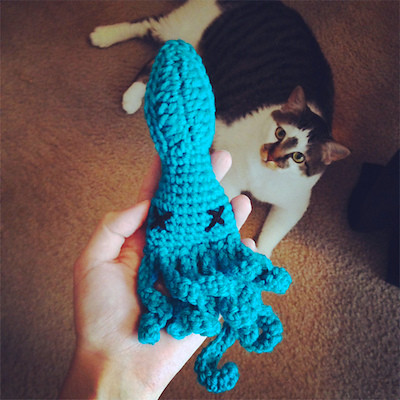 Purple crochet squid cat toy, a unique and alien-like design for cats
