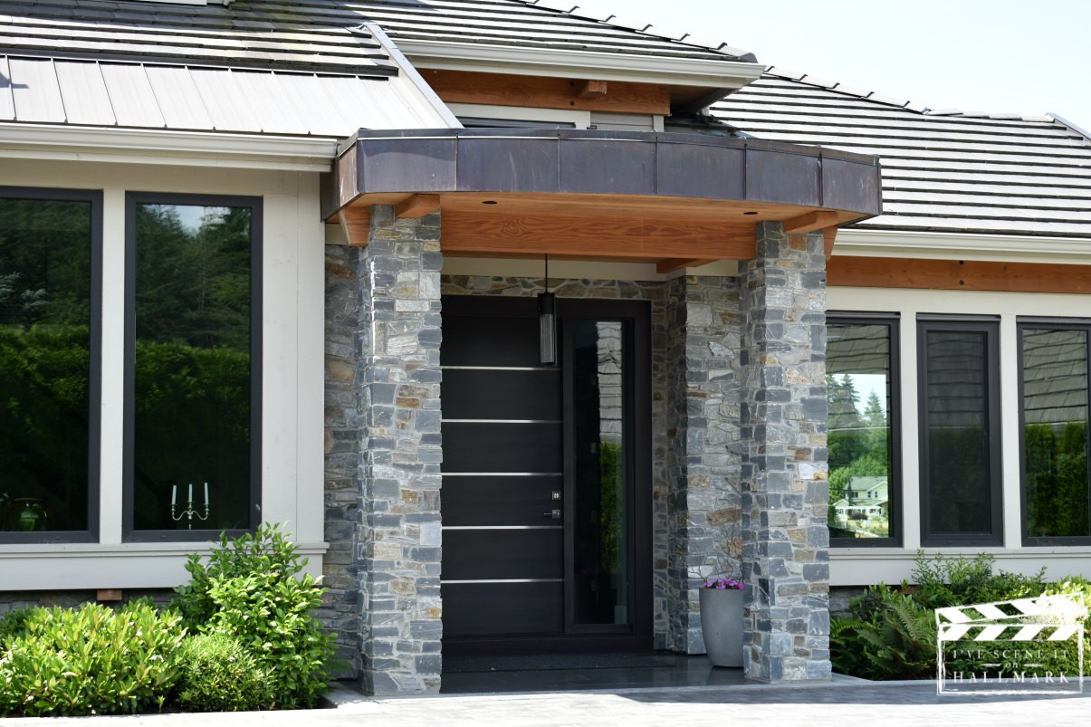 Front porch of the vacation rental house from Like Cats &amp; Dogs film, highlighting its welcoming entrance and rustic charm