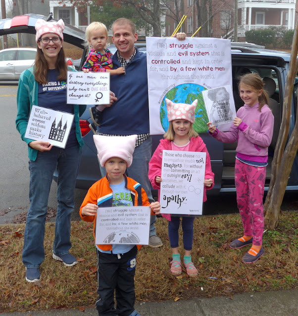 Neighbor offering hats at Women's March