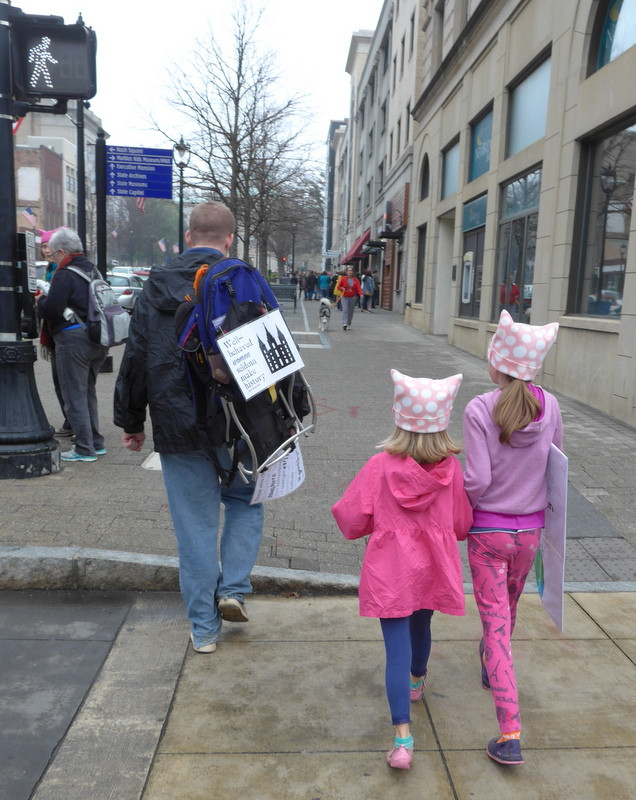 Girls crossing street after Women's March