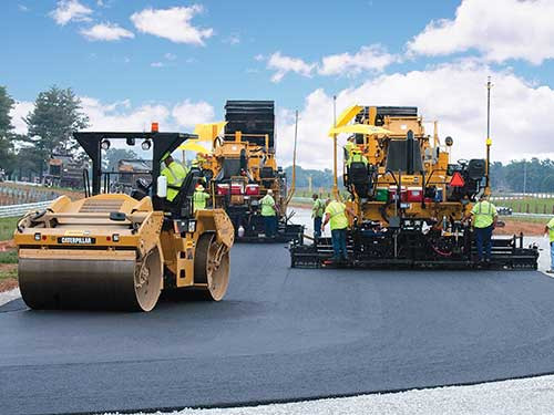 CAT equipment in paving and road building