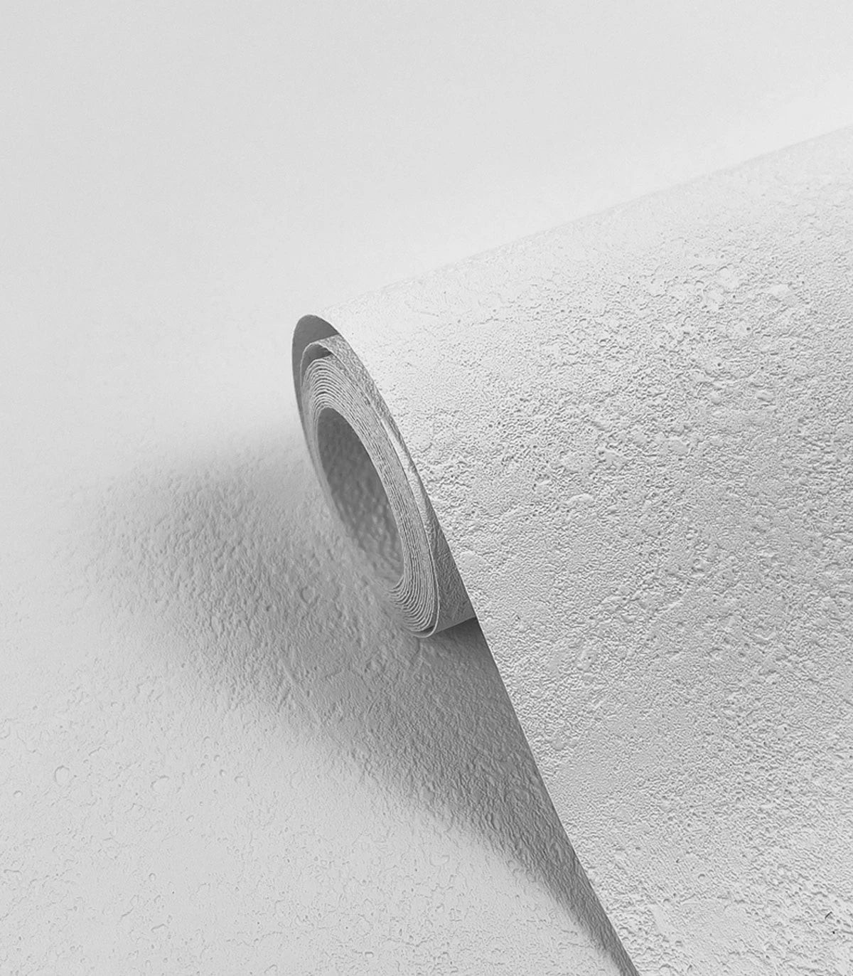 Close-up of Pro-Vinyl Concrete wallpaper, displaying its concrete-like texture that brings a modern and urban feel to cat-themed interior designs.