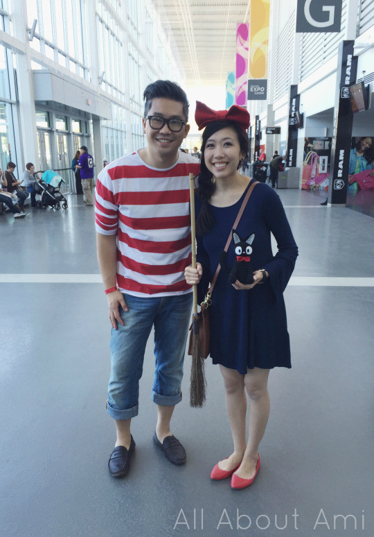 Family cosplay at Edmonton Expo, showcasing Kiki's Delivery Service theme and Jiji cat