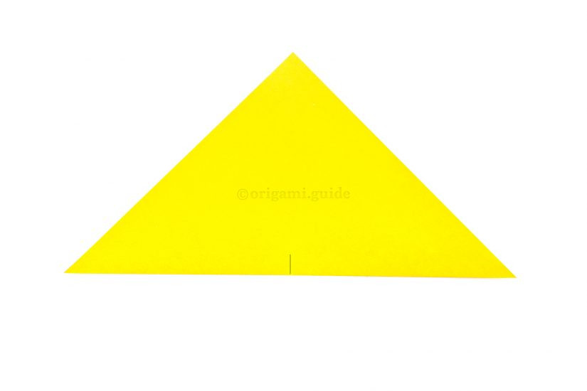 Unfolding the triangle to reveal the marked middle point on the bottom edge
